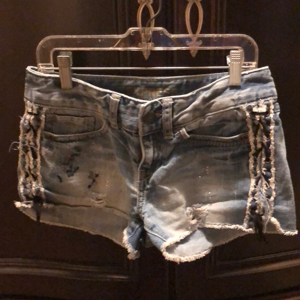 Distressed denim Express shorts with jewels